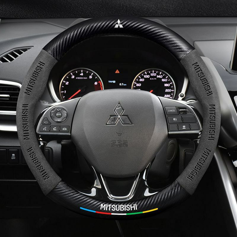 Couvre-volant en fibre de carbone et daim pour véhicules Mitsubishi.