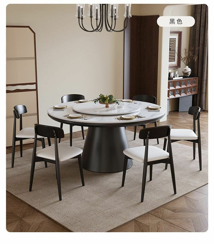 Table à manger ronde moderne en bois avec un plateau en pierre frittée et un plateau tournant central (type Lazy Susan), accompagnée de six chaises assorties au dossier incurvé et à l'assise grise.